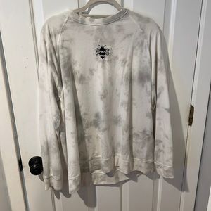 Lightweight comfy gray and white tie-dye sweatshirt with a bumble bee